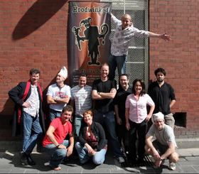 Hoodwinked Contestants - Red Symons, Jimeoin, Justin Morley, Tom Gleeson, Justin Hamilton, Fiona O'Loughlin, Harry Angus (The Cat Empire). FRONT: Lawrence Mooney, Bev Killick & Bob Franklin ABOVE: Marcus Jones